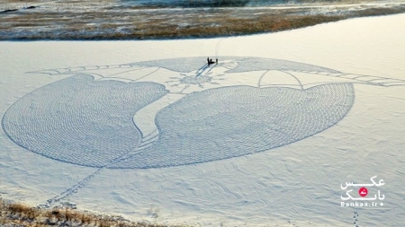 مردی که برای ایجاد طرح اژدها، تمام روز را در برف قدم زد