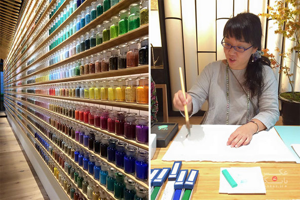 فروشگاهی با دیواری از رنگدانه ها برای حمایت از تکنیکهای هنری سنتی/بانک عکس